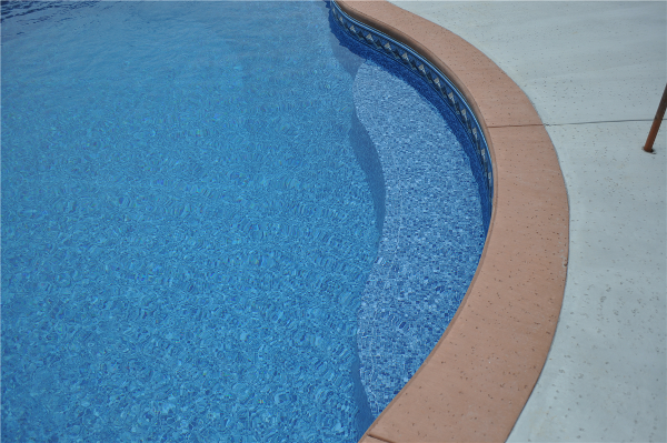 Countoured In-pool Bench Seat, Colored Concrete Coping with Salt Treatment