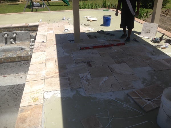 Installing Beautiful Travertine Tile over Concrete Deck with Crack Barrier